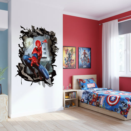 Spider-Man 3D wall decal showing the superhero breaking through a wall, displayed on a white wall in a room setting with a desk and chair visible.