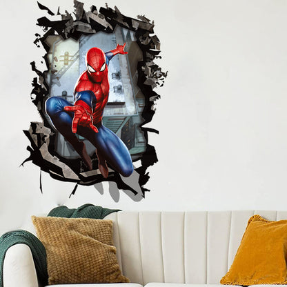 A large Spider-Man wall decal showing the superhero breaking through a cracked wall, displayed above a white sofa with decorative pillows in a living room setting.